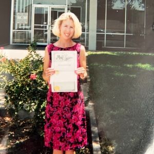 Size large but wears like a medium.  Sleeveless dress. Excellent condition